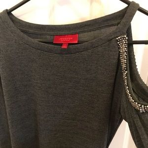 Open shoulder shirt. Never been worn